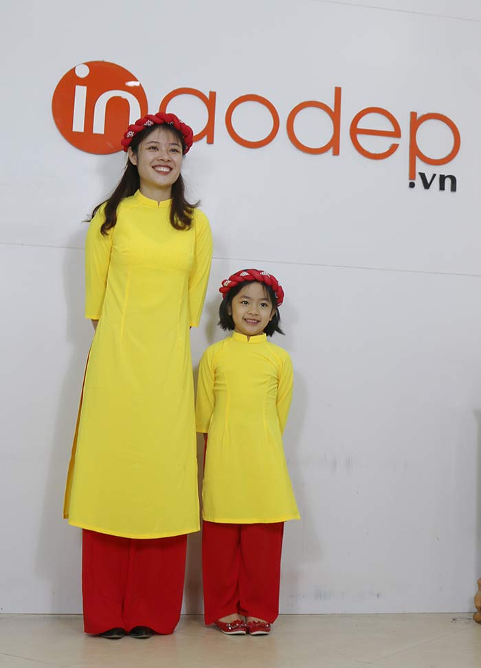 Áo dài mẹ và bé màu vàng  | Ao dai dong phuc